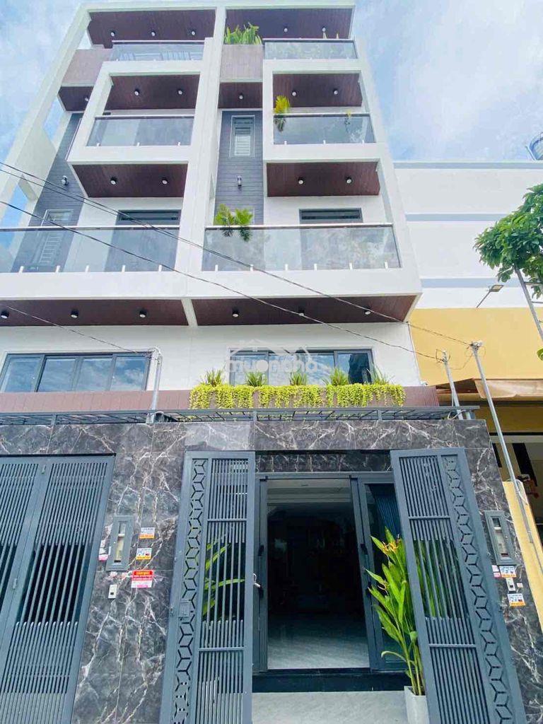 Nhà mặt tiền thạnh lộc 39 q12,lửng 3 lầu - 2