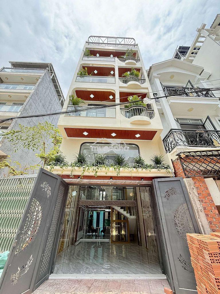 Siêu phẩm ngang 5,5m 4 tầng thang máy hẻm 14m thông khu vip tch 10 - 4