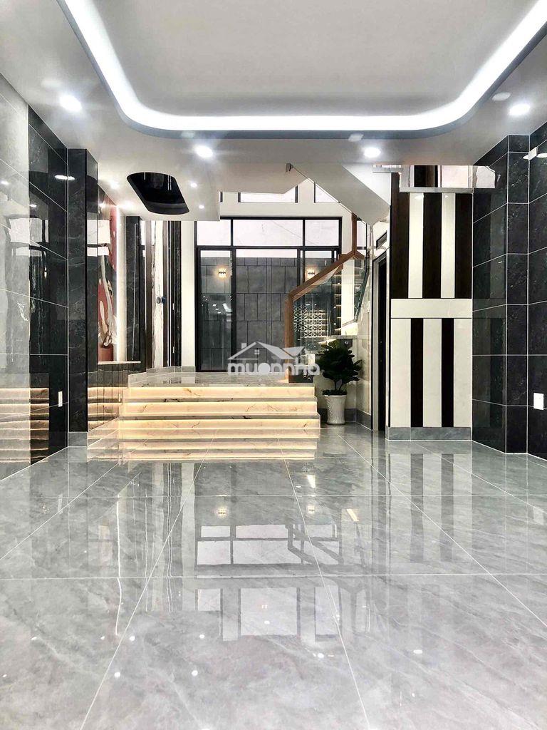 Nhà 4x14 1 trệt 1 lửng 3 lầu 4pn/5wc đường 26/3 bhh bình tân