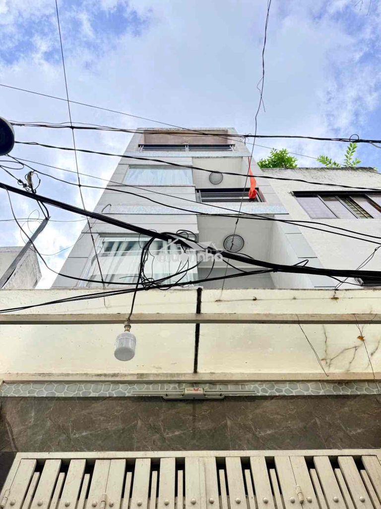 Nhà 4 tầng lầu. 4 phòng ngủ. dt 48m huỳnh văn bánh. thông ra lê văn sỹ